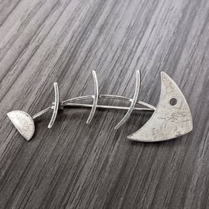 Silver fish skeleton pin stamped